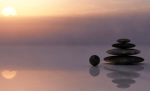 zen picture of rocks and a sunset